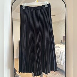Black pleated midi skirt